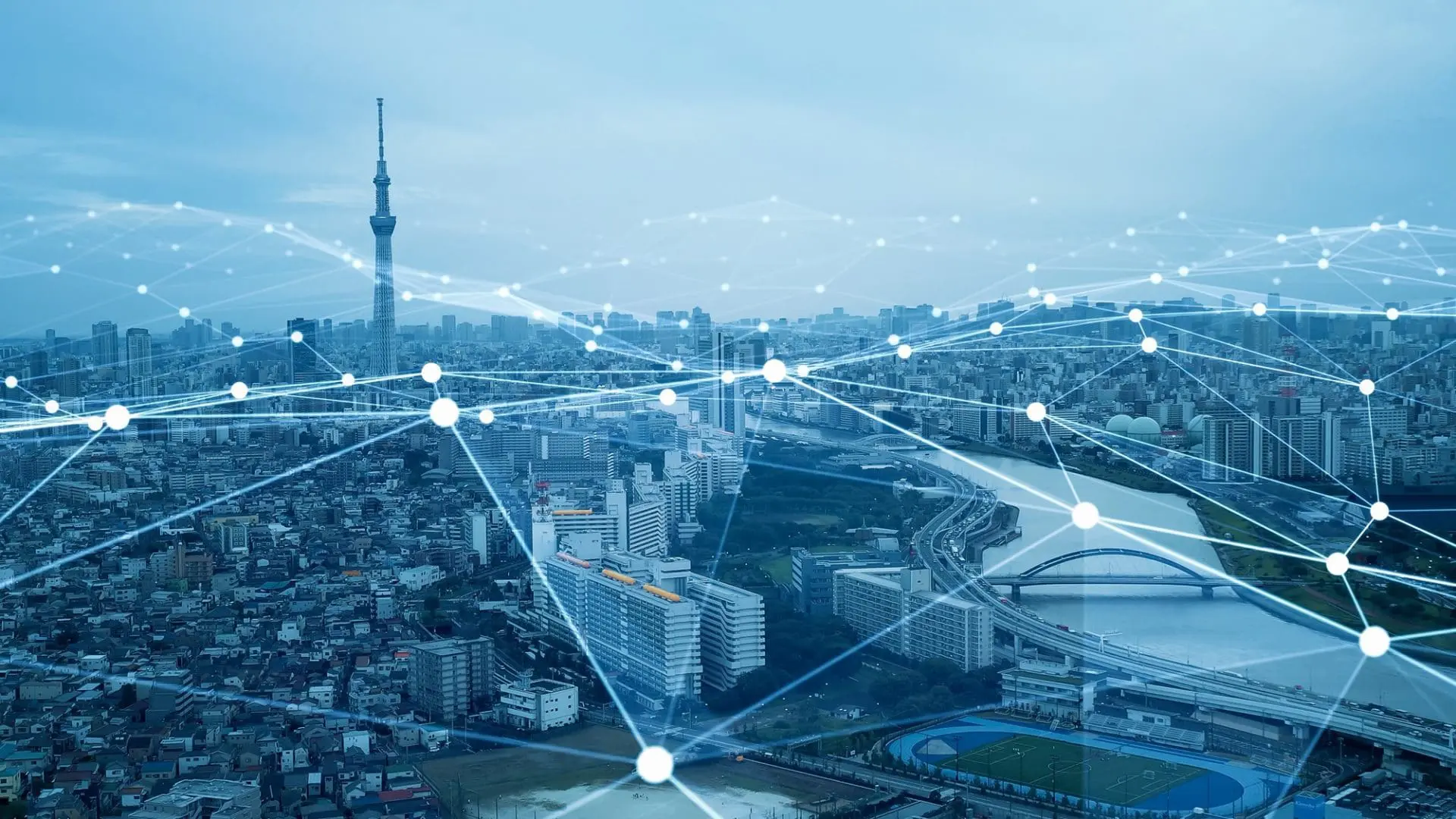 Cityscape with digital network lines, highlighting technology connectivity for fire kills campaign.