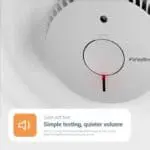 FA6615-R smoke alarm on ceiling with red light for quiet self-test and low-volume testing.