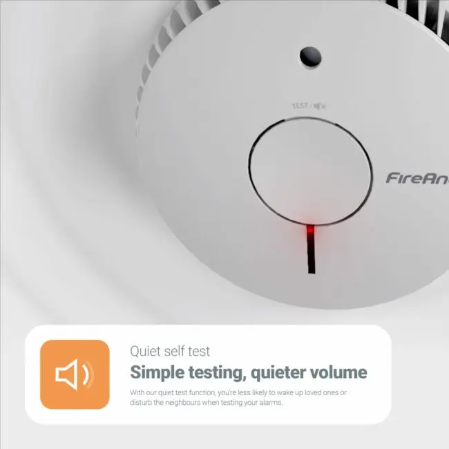 FA6615-R smoke alarm on ceiling with red light for quiet self-test and low-volume testing.