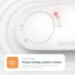 FA3328-EUT carbon monoxide alarm with red CO indicator and quiet self-test shown close-up.