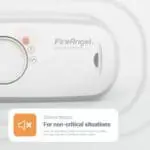 Close-up of a FireAngel FA3313x4 carbon monoxide alarm with highlighted silence feature.