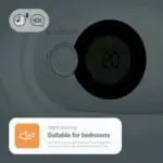 Close-up of a FA3322 carbon monoxide alarm showing 20°C and night sensing display.