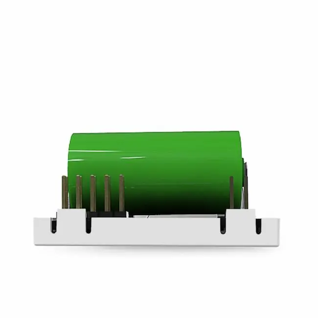 FS1521W2-T, green component with metal pins on a white base, side view.