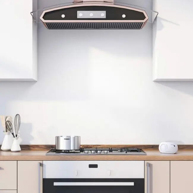 Modern kitchen with an FA3328-EUT cooker, pot, utensils, and a cooker hood over the hob.