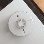 FA6720-R smoke alarm mounted on a white ceiling.