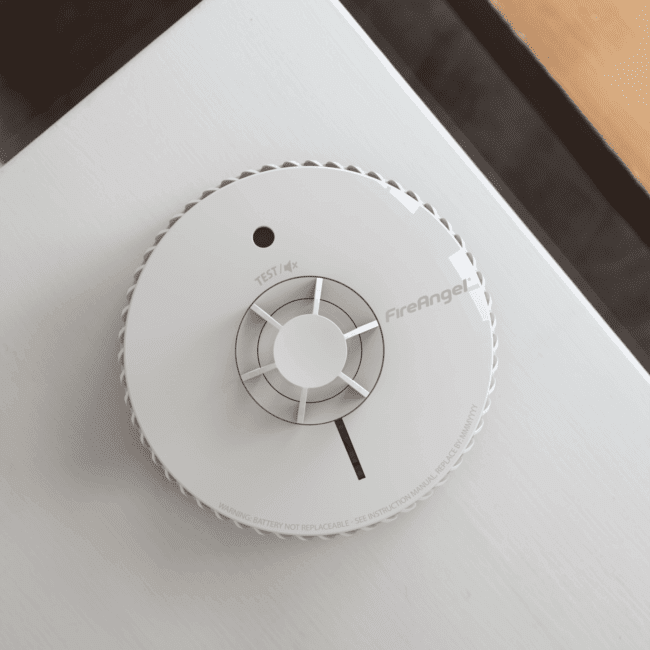 FA6720-R smoke alarm mounted on a white ceiling.