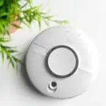 The SCB10-R is a circular white object with a circular black top.