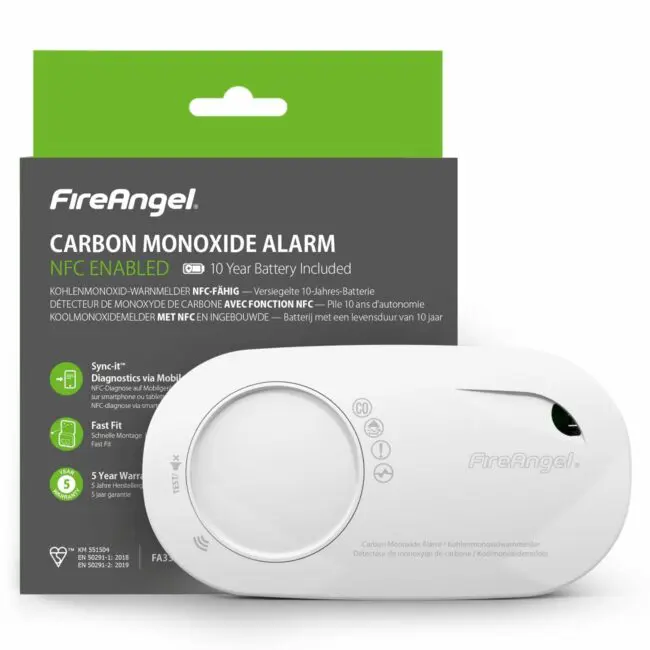 FA3328-EUT carbon monoxide alarm in white, with green and black packaging in the background.