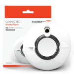 Two FP2620W2-R smoke alarms in white are placed in front of their packaging box.