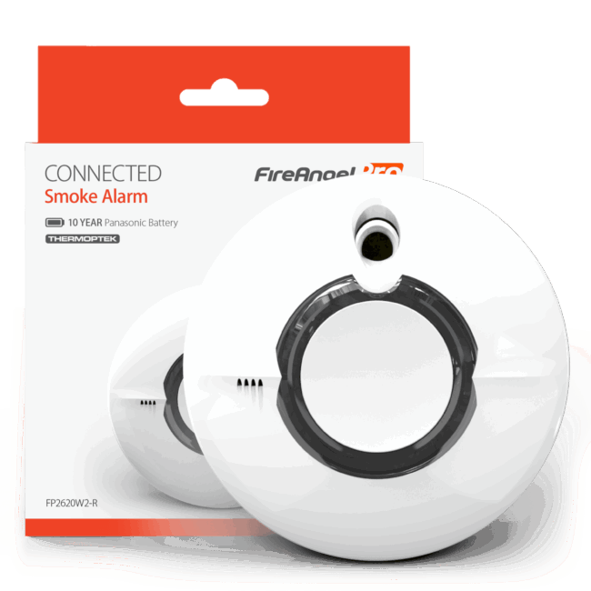 Two FP2620W2-R smoke alarms in white are placed in front of their packaging box.