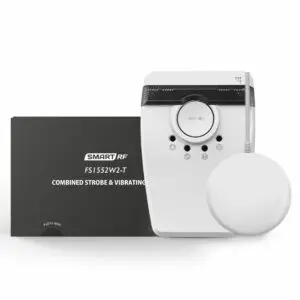 FS1552W2-T: white vibrating alarm with round pad, black box labelled Combined Strobe & Vibrating.
