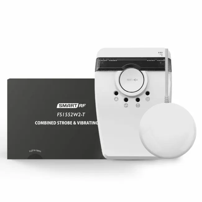 FS1552W2-T: white vibrating alarm with round pad, black box labelled Combined Strobe & Vibrating.