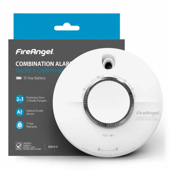 SCB10-R smoke and carbon monoxide alarm displayed in front of its packaging.