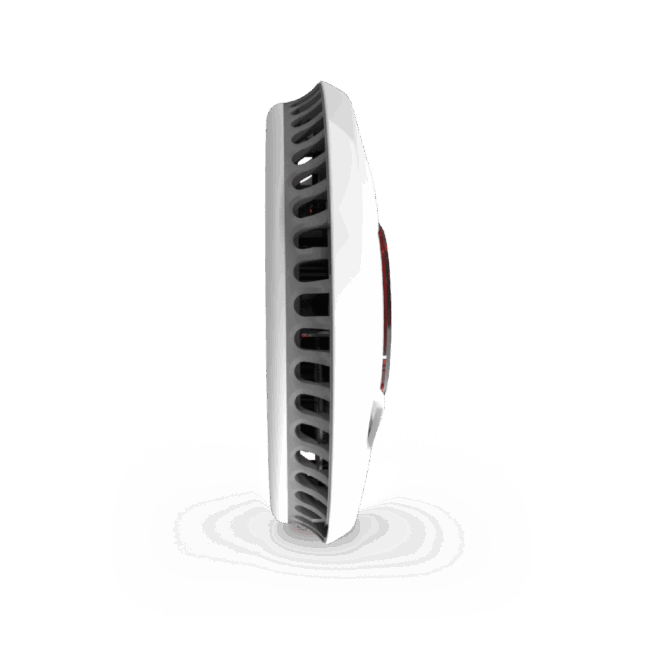 Side view of the ST-750T, a white, round device with vent-like openings on display.