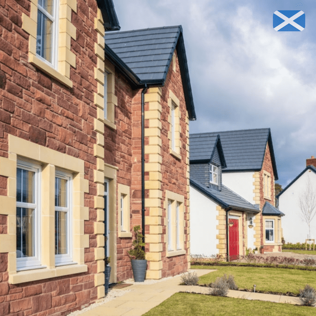 Two stone houses with blue roofs, Scotland flag, and Contractor Guidance in the top right corner.