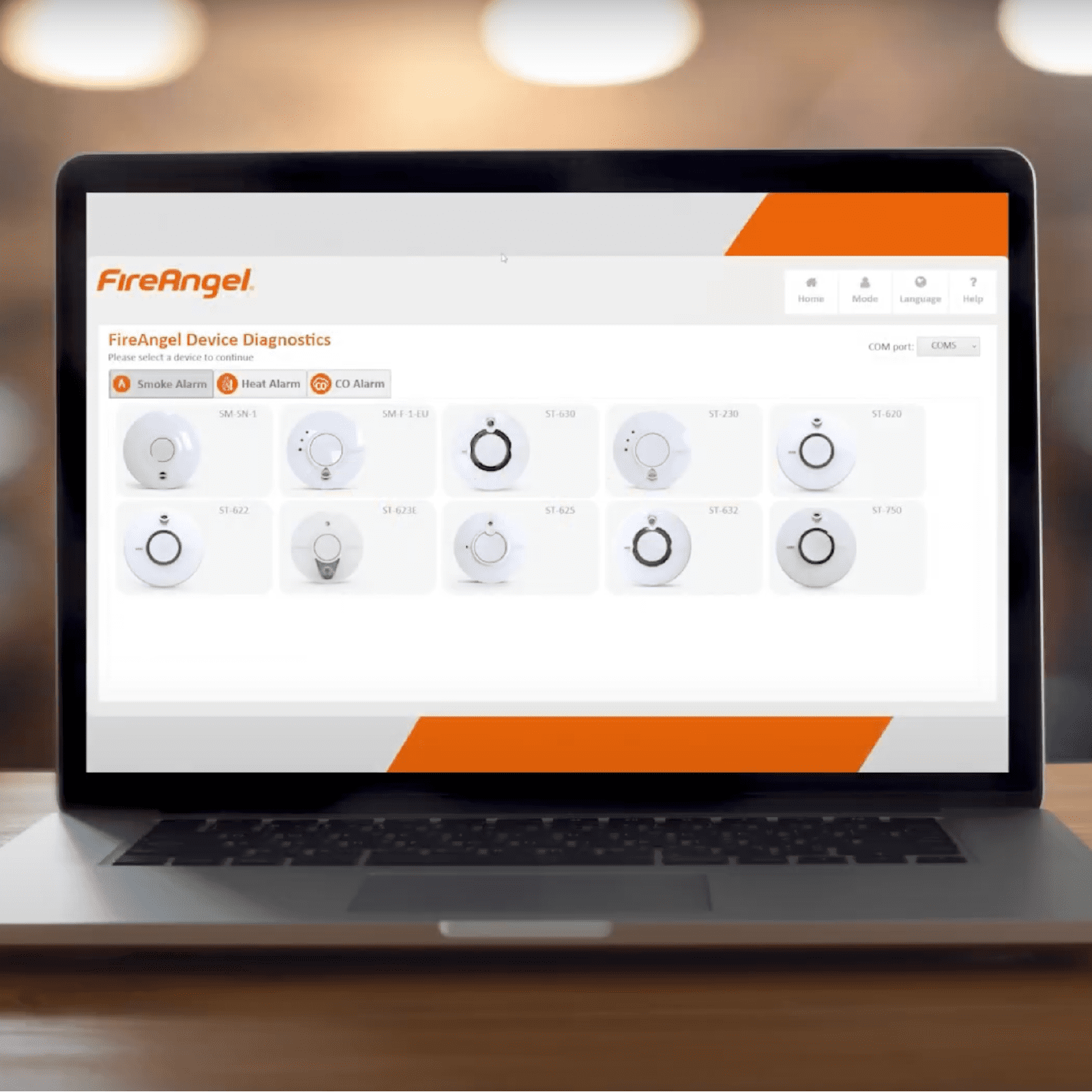 Laptop displaying FireAngel Device Diagnostics Software with various alarm icons on the screen.
