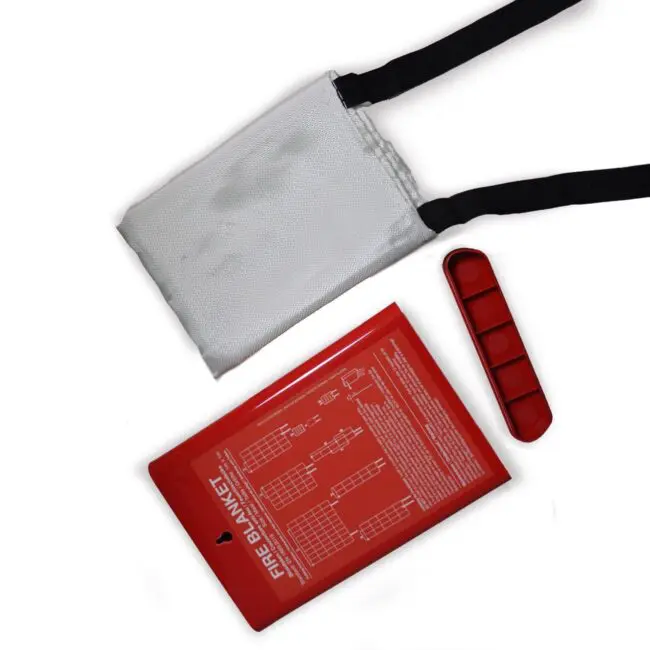 FB100-FA-EUR fire blanket, folded, black straps, red case with instructions.