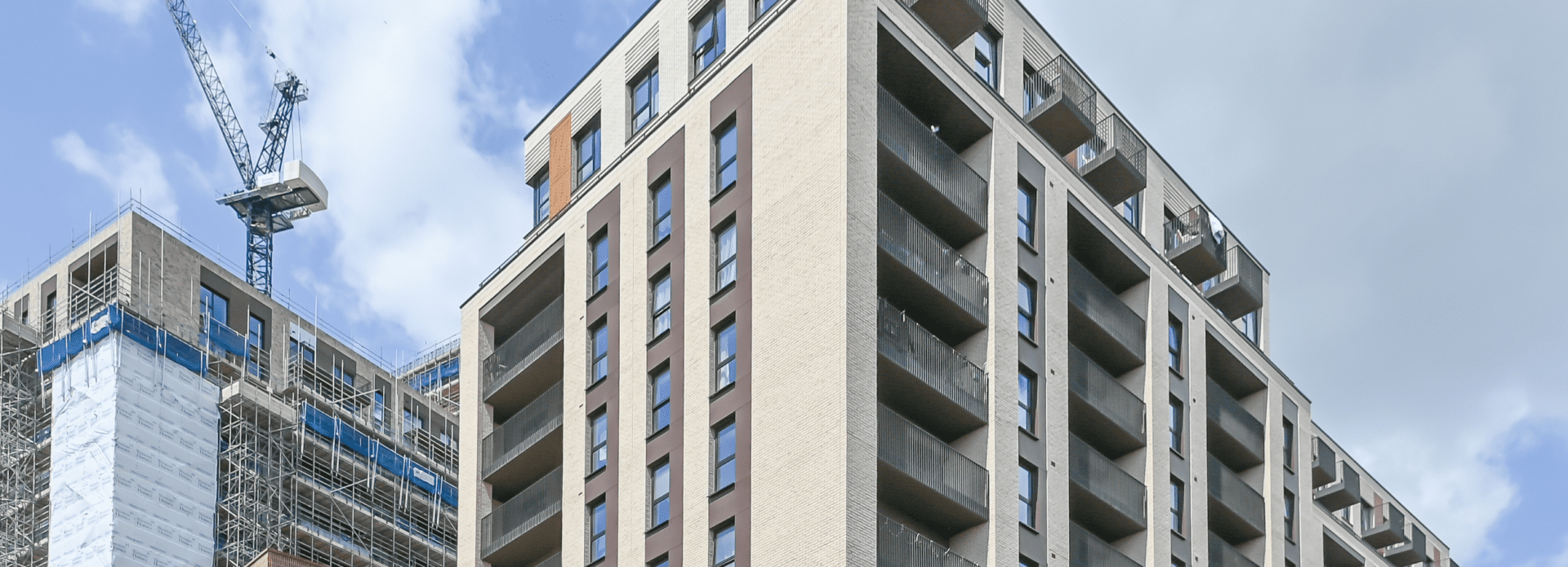Gateway 2 & 3 set a new standard in fire safety design amid construction and blue skies.