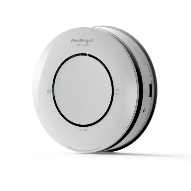 Spec+ Optimised Heat Alarm, white and circular with a central test button, on a white background.