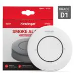 White FireAngel smoke alarm and red packaging labelled Smoke Alarm Thermoptek, Grade D1.