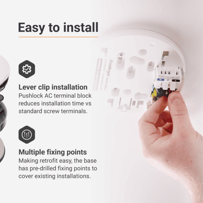 Hand connecting wires to Spec+ Multi-Sensor Alarm with installation instructions visible.