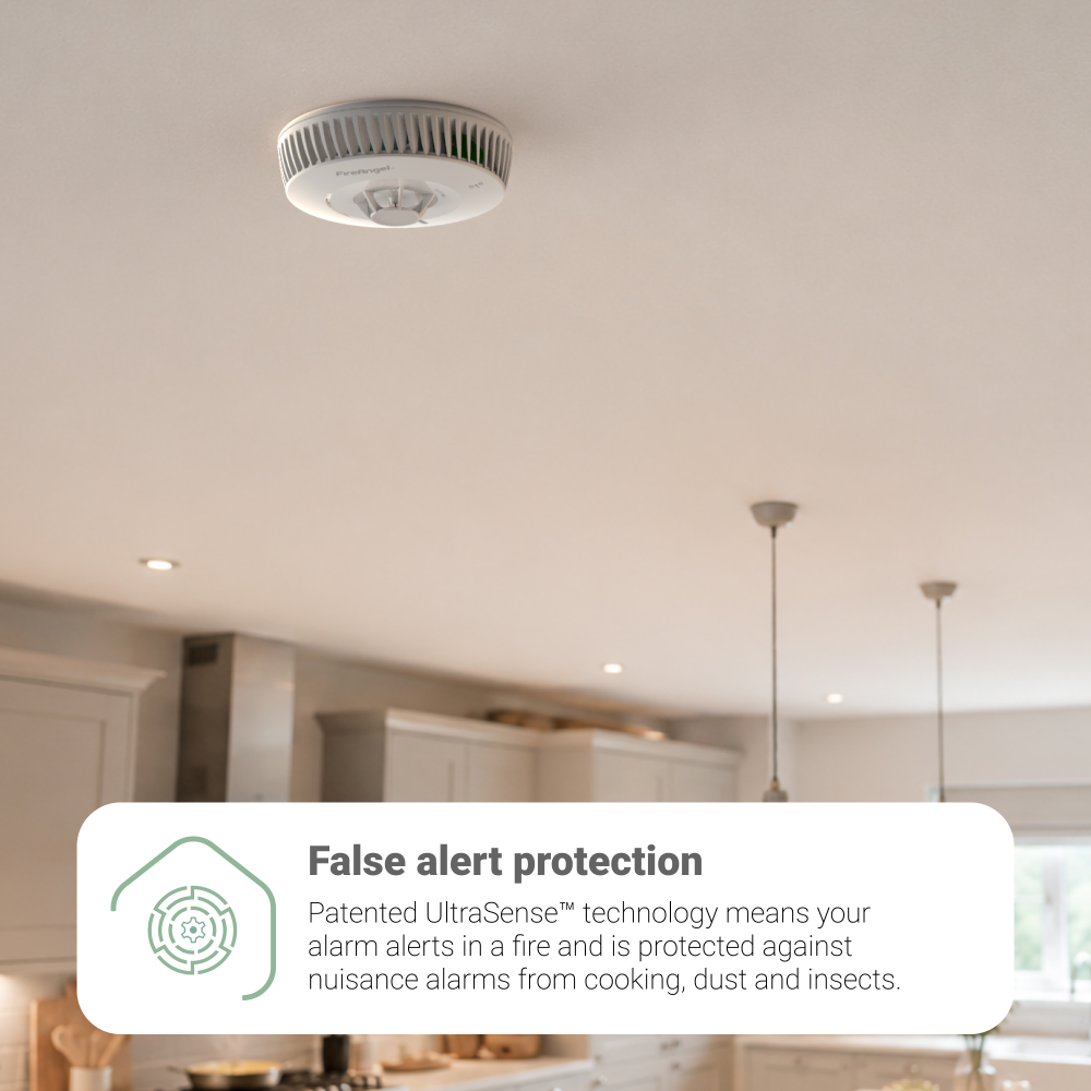 FA8620BW-R smoke alarm with UltraSense™ tech installed on kitchen ceiling for fewer false alarms.