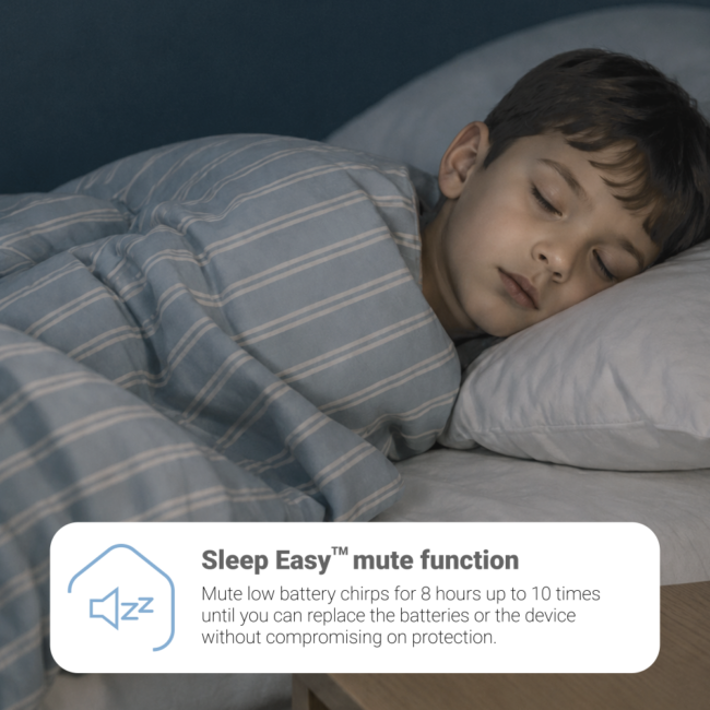 Boy sleeps soundly with FA8620BW-R’s silent alarm for peaceful nights.