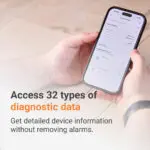 Hands hold a mobile phone showing Angel Pro property and device diagnostic data.