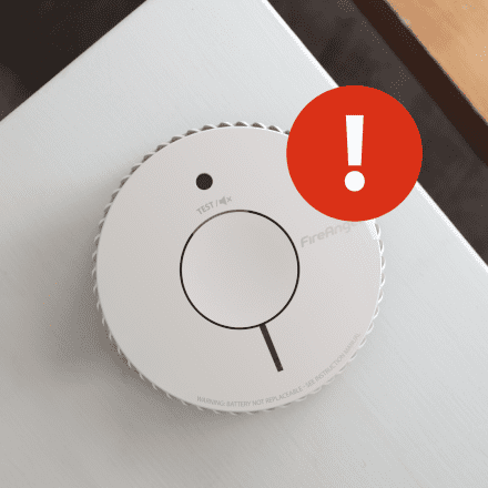 How do I stop my smoke alarm from beeping? image